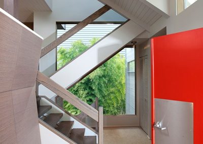 open red front door modern custom home vancouver