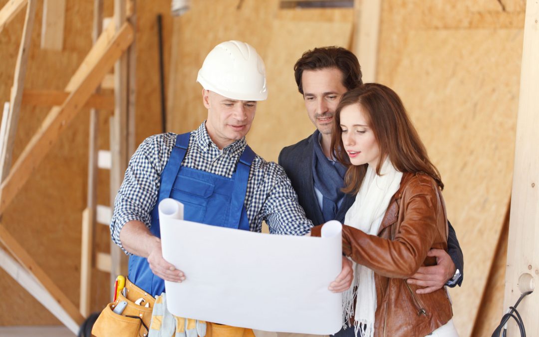 Looking at blueprints with homeowners
